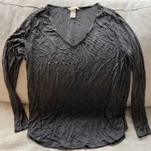 H&M dark gray, long sleeve, v-neck tee shirt. Size medium.